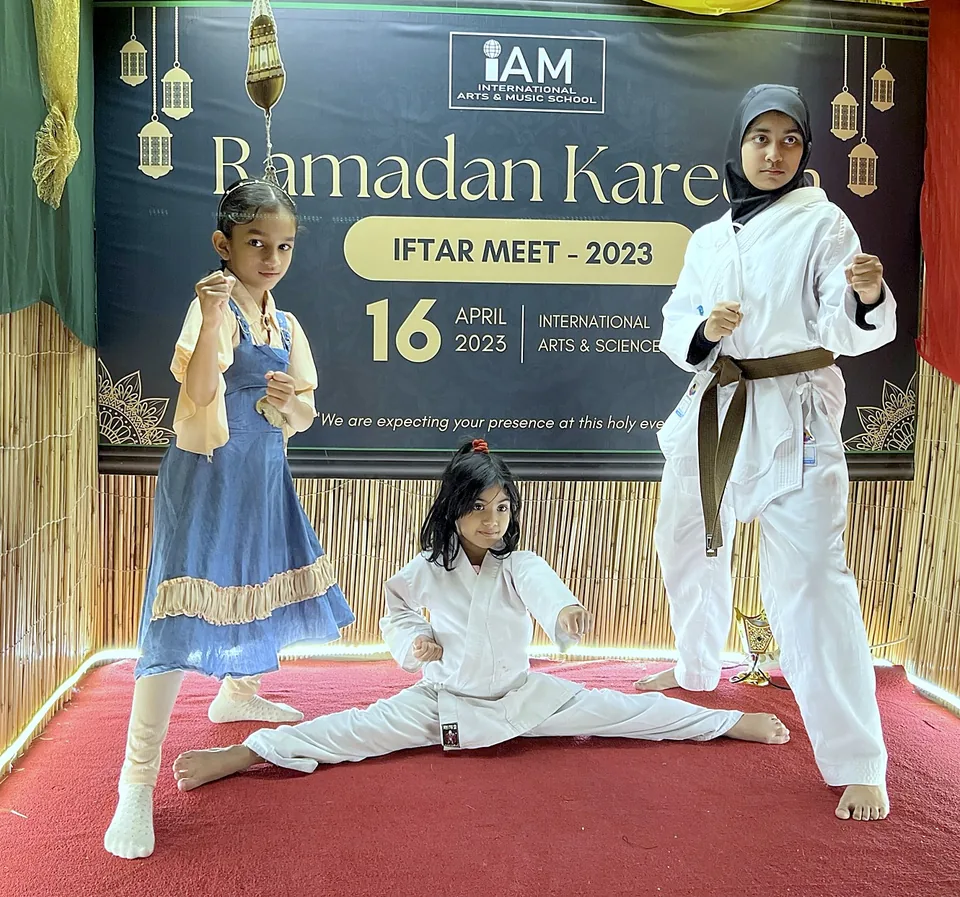 Chi Club students giving a karate demonstration at a community Iftar event
